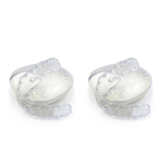 Two silver rings with intricate designs on a white background